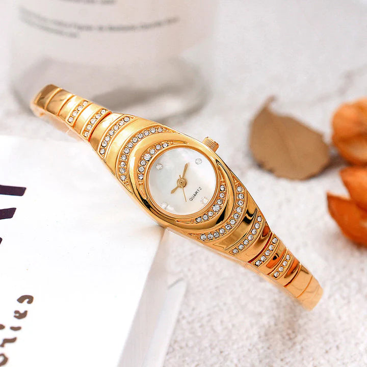 Reloj pulsera de oro para mujer